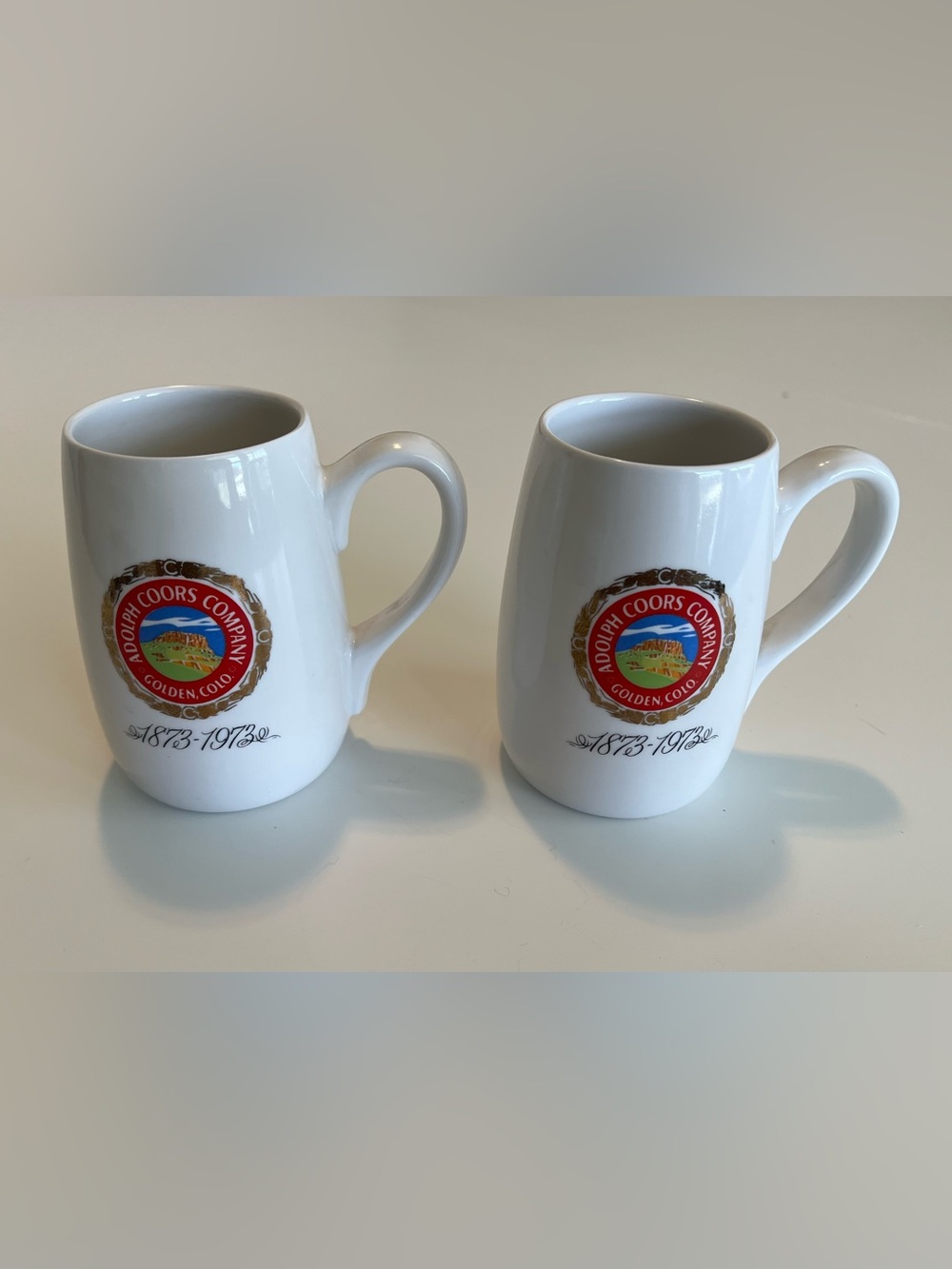 Pair of Vintage Adolph Coors 100 Years Anniversary (1873-1973) Mugs